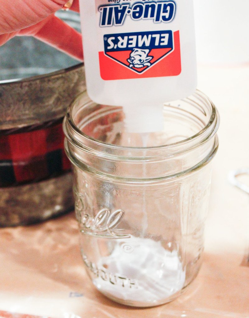 adding elmer's glue to empty jar