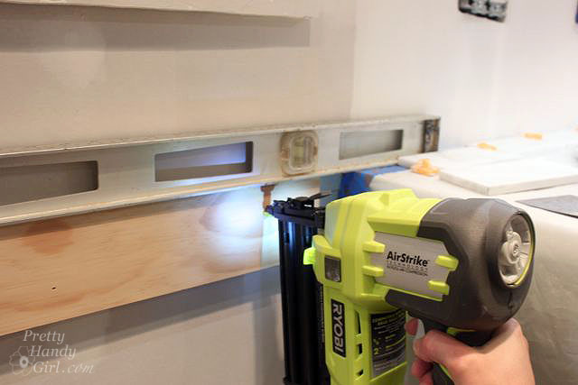 Attach support board to wall with Ryobi Finish Nailer 