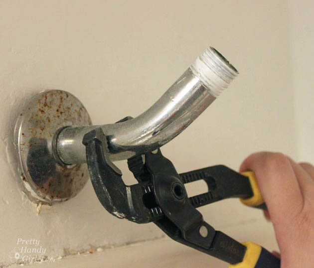 unscreEasy! How to Install a New Showerhead | Pretty Handy Girlw-old-shower-arm