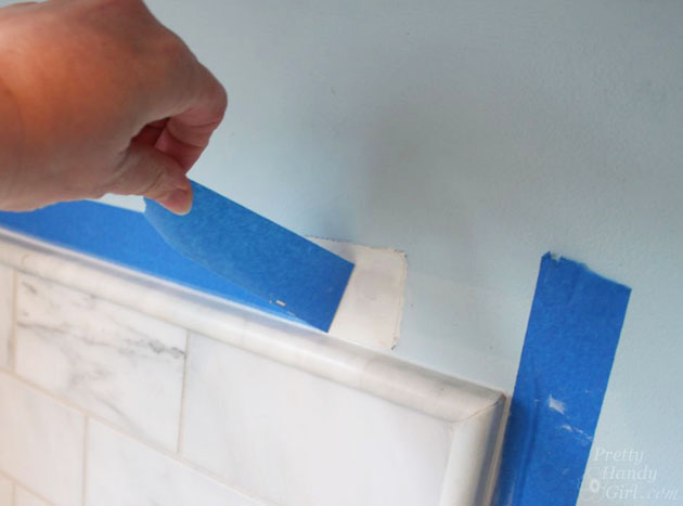 remove-painters-tape-caulk-backsplash