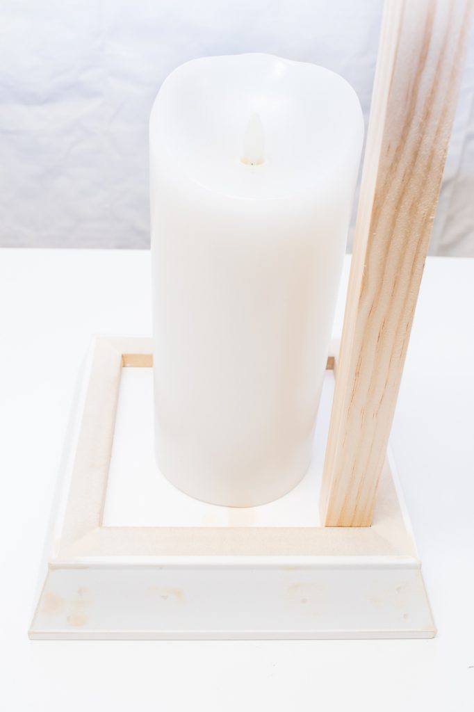 Use your square dowel to eyeball how tall you want your candle lantern to be.