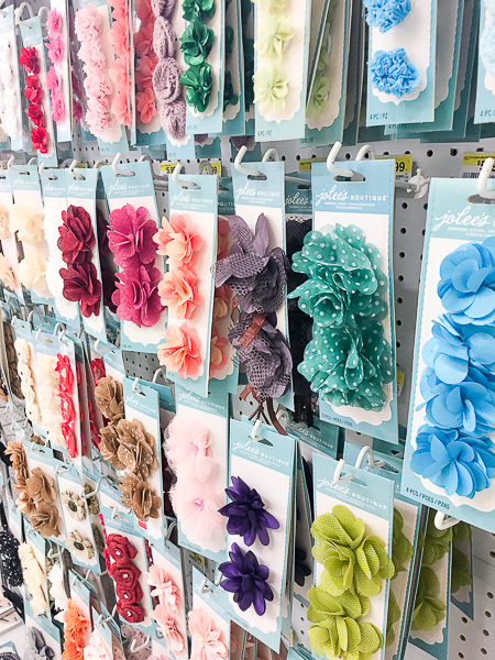 The scrapbooking aisle is the perfect place to look for things to decorate your curtain tie backs.