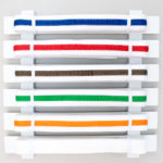 This simple karate belt display is easy to make and customize to any number of belts.