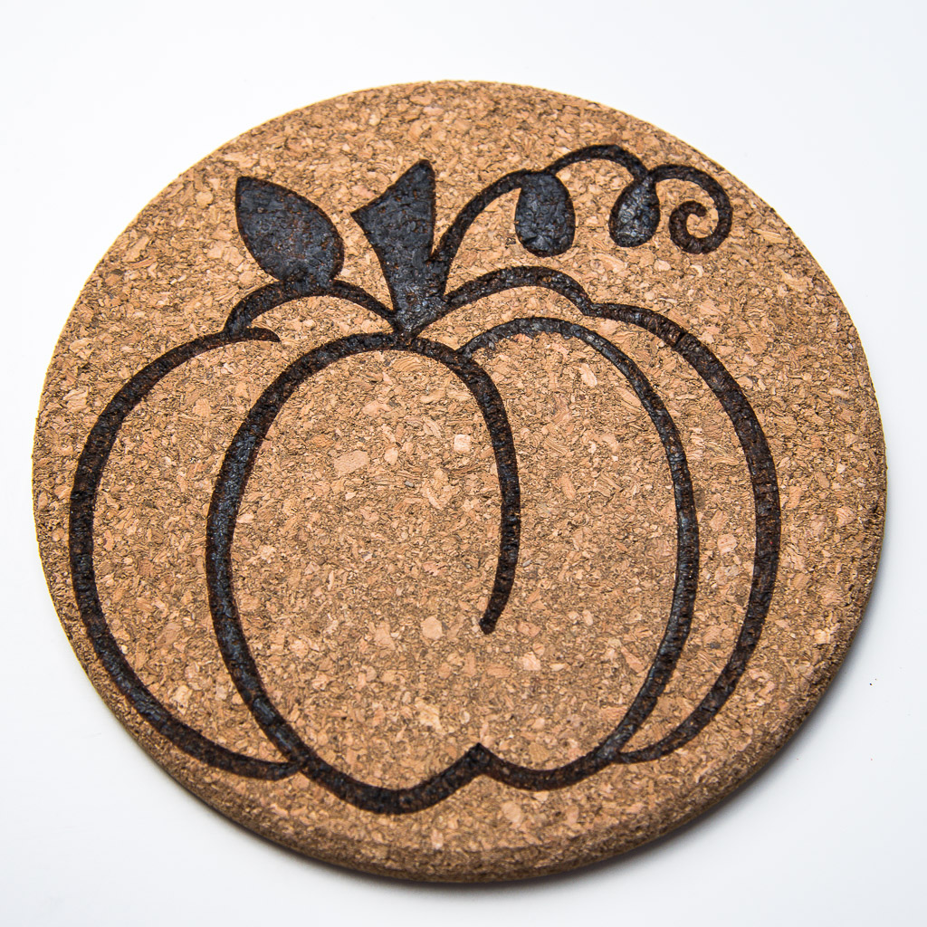 This pumpkin cork trivet is perfect for both Halloween and Thanksgiving themes!