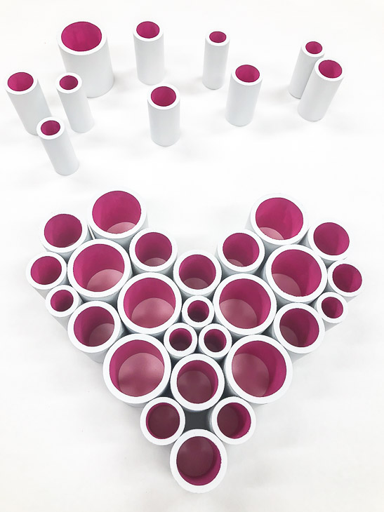 Play with the arrangement of PVC pipe until you form a heart!