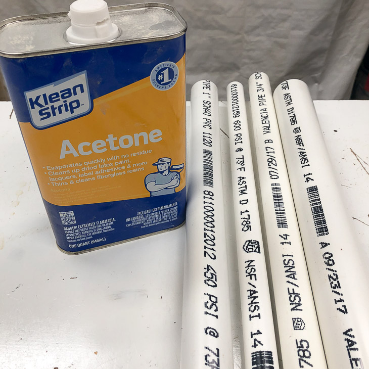 Remove printing on the PVC pipe with acetone.