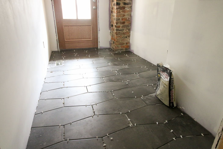 Installed Castle Rock Hex tiles gray in mudroom floor