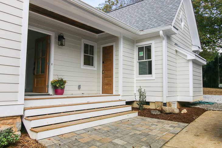 side view with paver patio