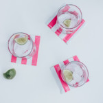 Tutorial for making these DIY oilcloth, water resistant drink coasters for Summer!