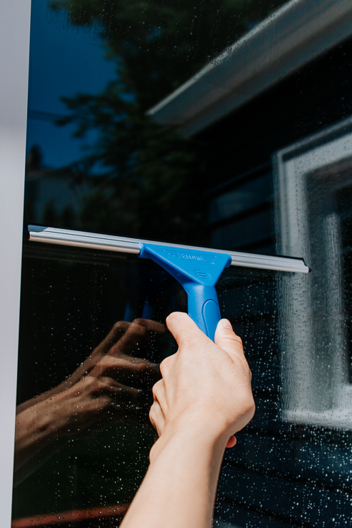 Squeegee water and soap from your windows