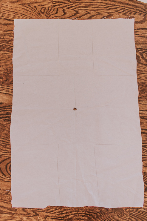 Create a hole in the center of the fabric