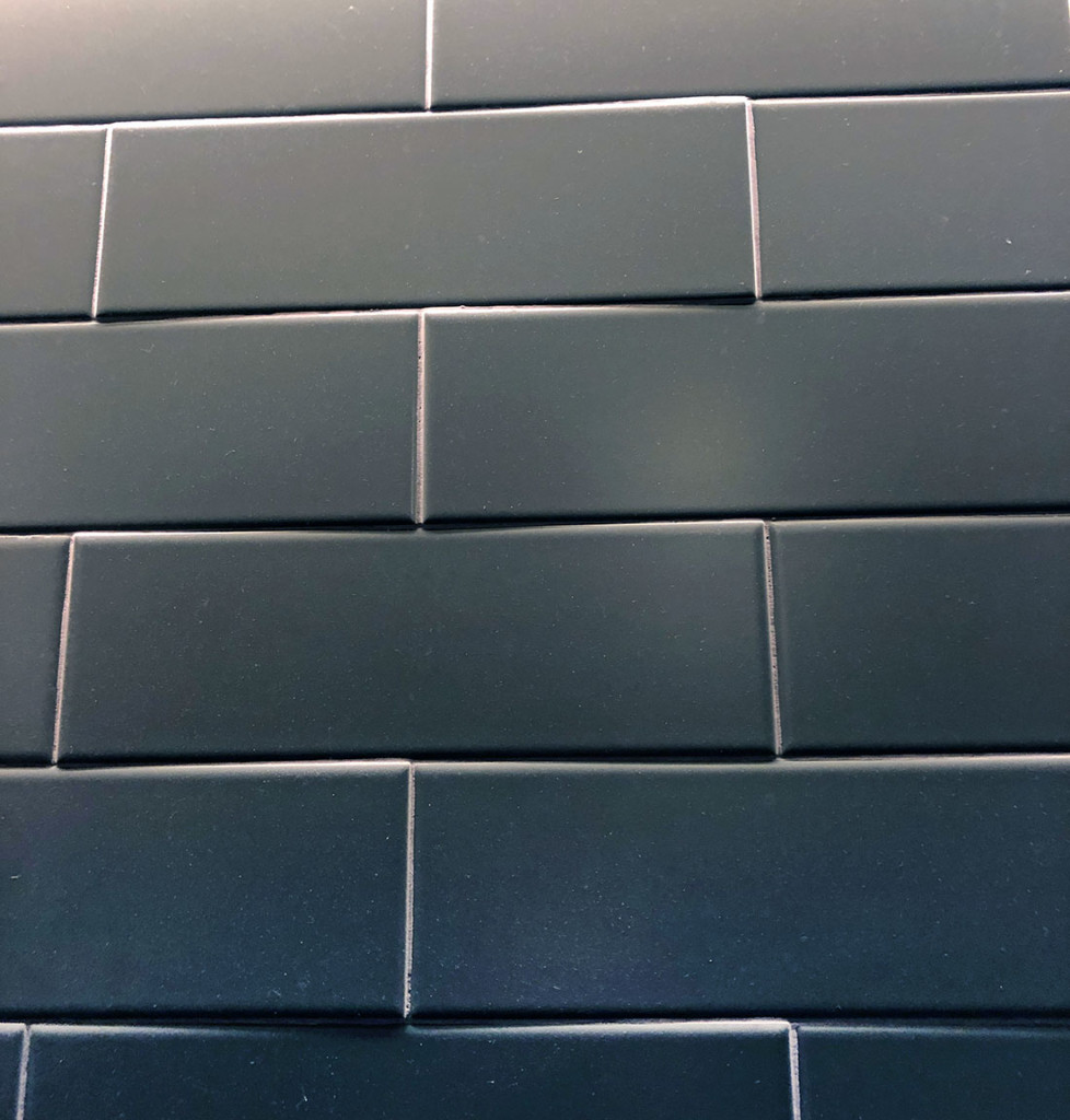 bowed tiles at 50% offset shows shadows and lippage
