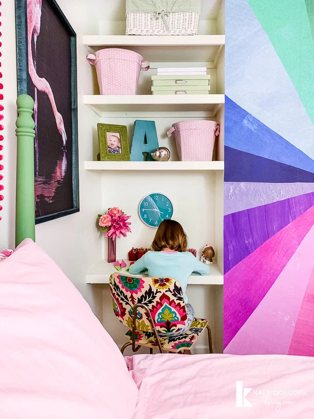 colorful kids room with floating shelves